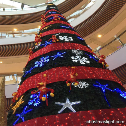 Big cool christmas trees with light ornaments