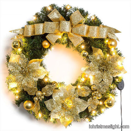 Warm white lighted gold Christmas wreaths