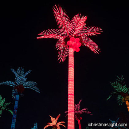 Christmas lighted palm tree with red color