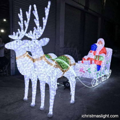 Christmas light Santa sleigh and reindeer