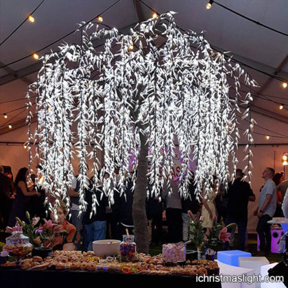 Large white lighted wedding willow trees