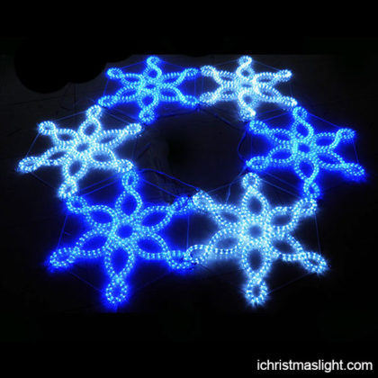 White and blue large lighted snowflakes