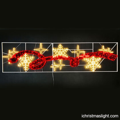 Red light ribbon with snowflakes and stars